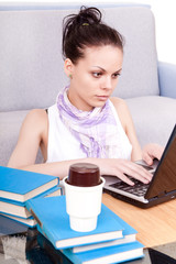 Fototapeta na wymiar female studnet working on laptop
