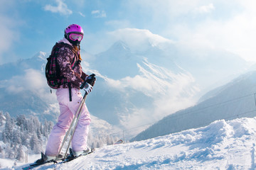 Woman skiier. The Alps