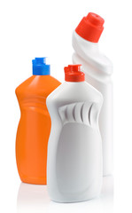 orange and white bottles for cleaning