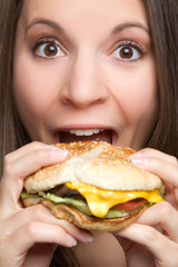 Woman Eating Hamburger