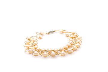 Pearl necklace isolated on the white background © birdmanphoto