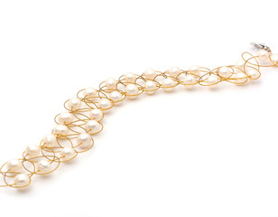 Pearl necklace isolated on the white background © birdmanphoto
