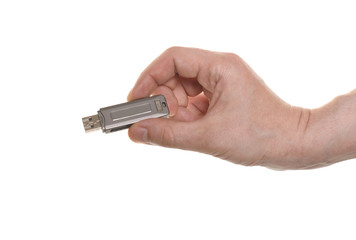 hand with a USB flash isolated over white