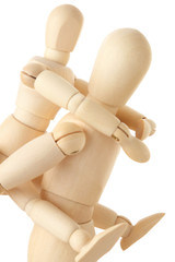 wooden figures of child sitting on back of his parent, half body
