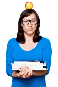 nerdy young female with books and apple