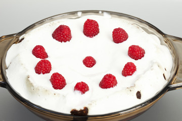 Decorated Raspberry and Cream Icing on a Chocolate Cake