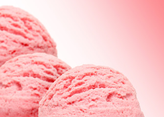 Strawberry ice cream scoops isolated on pink background