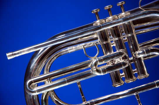 Marching French Horn Isolated on Blue