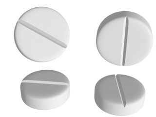 white tablets in different positions on white background