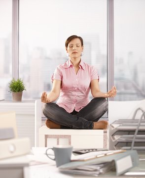 Office worker meditating