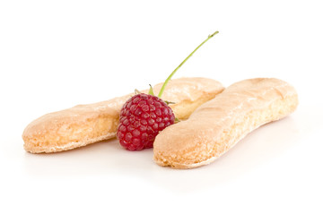 Biscuits and raspberries isolated on white