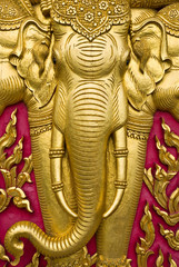 elephant carved gold paint on church door