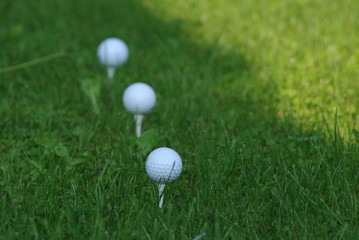 three golf balls