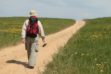 lone traveler uphill