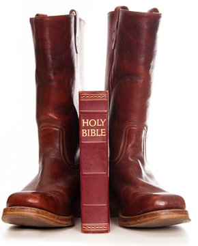 Cowboy boots and the holy bible concept image