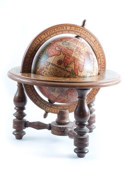 Old wooden globe showing Europe on isolated background.