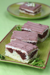 Zucchini cake with vanilla cream and chocolate sour cream glaze
