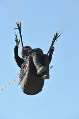sports parachutist flying with paragliding
