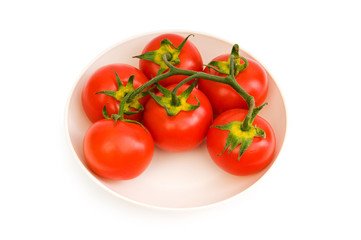 Red tomatoes isolated on the white background