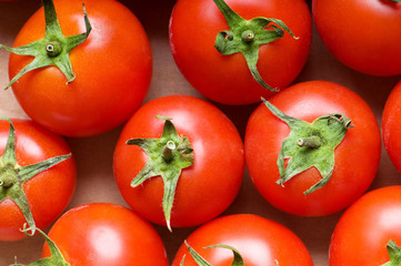 Red tomatoes arranged at the market stand