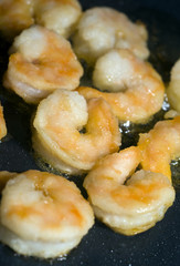 shrimp cooking in frying pan
