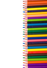 Colored pencils on a white background, studio shot