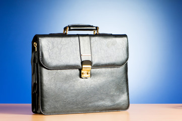 Leather case on the table against background