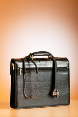 Doctor's case with stethoscope against colorful background