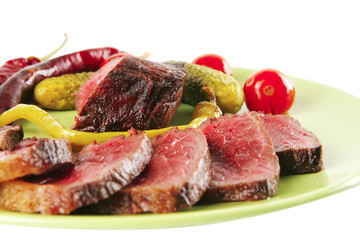 meat and vegetables with peppers