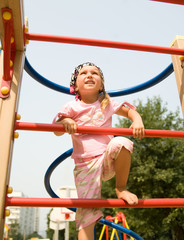 Fototapeta premium Cute girl on playground