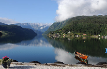 Reflections in Hardangerfjord at Ulvik, Norway