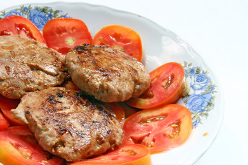 Pork and onion HamBurger with Red slced Tomato