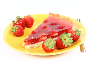 Piece of Strawberry Tart on a yellow plate with strawberries