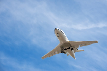 unmarked business jet on landing approach