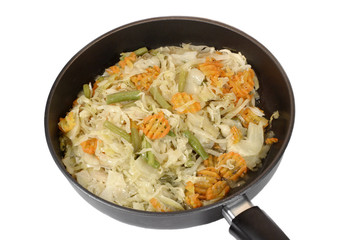 Fototapeta na wymiar Stewed vegetables on dripping pan isolated on white