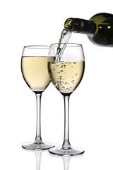 White wine poured into glass.