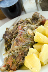 greek taverna food lamb in the paper