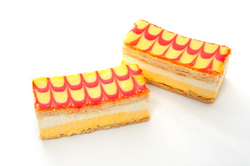 two delicious Tompouce pastry over white background