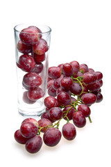 Grape cluster and  glass