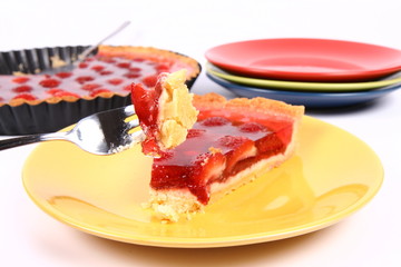 Piece of Strawberry Tart, some of the tart on a fork