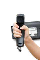 Telephone receiver in hand isolated on white background