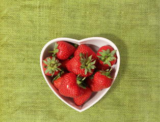 strawberries in a heart shaped bowl