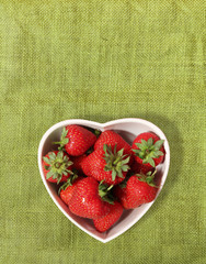 strawberries in a heart shaped bowl