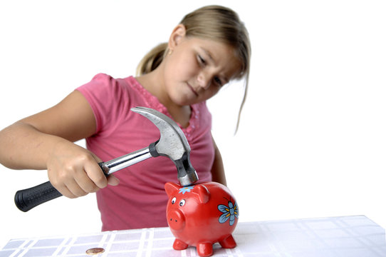 School girl and piggy bank