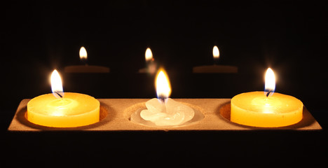 a white flower candle in centre piece