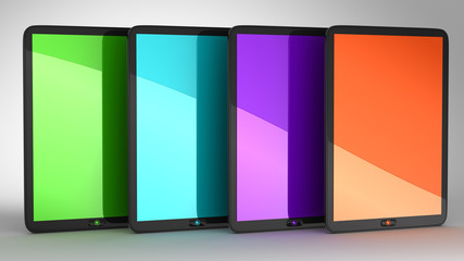 Group of four Tablets PCs with colored displays