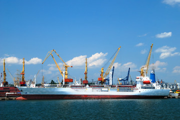 Naklejka premium Port warehouse with cargoes and containers