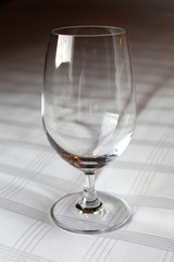 Wine glass on bed