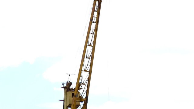 large ship's crane with sand