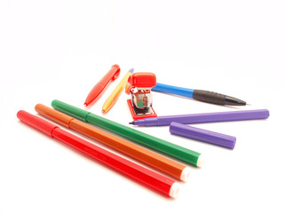 Stapler, the handle and a felt-tip pen
